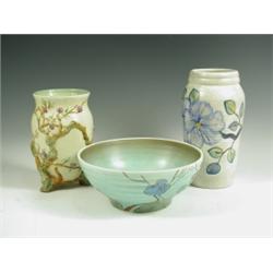 A Clarice Cliff moulded vase, a bowl and a Radford vase, 23.2cm high (3) Est. 70/100...