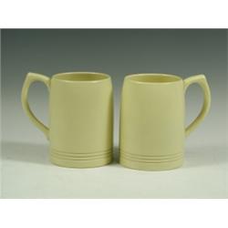 Two Wedgwood Keith Murray cream tankards, with blue printed marks, 12.2cm Est. 70/90...