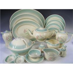 Ninety six pieces of Susie Cooper "Dresden Spray" pattern dinner and teaware comprising 11 cup...