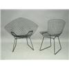 Image 1 : Harry Bertoia, a 'Diamond' chickenwire chair and another, with the original plastic coating<br...