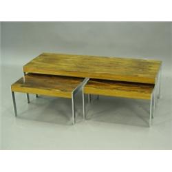An Archie Shine rosewood and chrome nest of three tables, c.1970, 123cm long Est. 150/200...