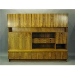 An Archie Shine rosewood veneered Bridgford wall unit, 229 x 186cm Est. 200/300...