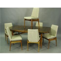 An Archie Shine rosewood veneered dining suite designed by Robert Heritage, comprising six din...