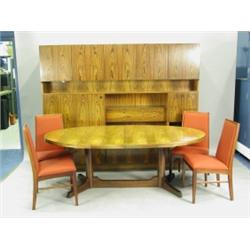 An Archie Shine dining room suite comprising eight Arlington chairs, an Ashburton extending ta...