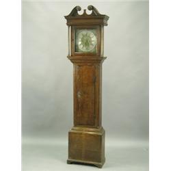 A 19th Century oak longcase clock, the 12 inch square brass dial with a 30 hour movement and t...