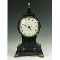 A 19th Century mantel clock, in a balloon shaped case, the striking movement with a painted di...