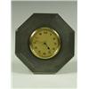 Image 1 : An octagonal silver cased eight day mantel clock, with engine turned decoration, 1924, 10cm di...