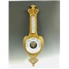 Image 1 : An Art Nouveau oak aneroid barometer with carved and pierced decoration, 87cm high Est. 180...