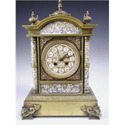 A Victorian Aesthetic mantel clock with porcelain columns, panels and dial and applied exotic...
