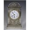 Image 1 : A late l9th/early 20th Century polished pewter arch top mantel clock, with applied strapwork t...
