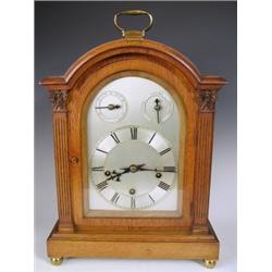 A late l9th Century oak dome top bracket clock, with 8 day chiming movement and repeating mech...