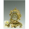 Image 1 : A 19th Century gilt bronze mantel clock, the silvered dial supporting a movement engraved 'Le...