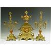 Image 1 : A late 19th Century gilt bronze clock garniture, mounted with porcelain vases and plaques, and...