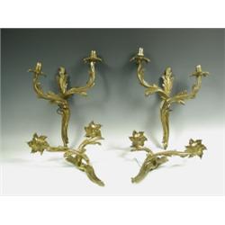 A set of four Rococo style gilt metal wall lights Est. 200/250...