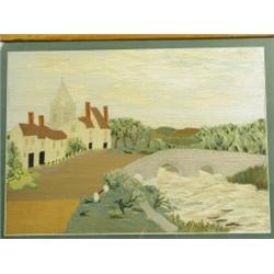 A woolwork picture depicting a village street with a bridge over a stream and a church beyond,...