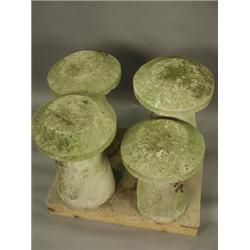 Four staddle stones with conical bases, tallest 75cm high x 47cm diameter Est. 200/300...