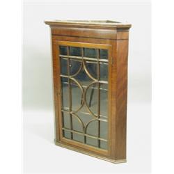 A 19th Century mahogany and ebony strung hanging corner cupboard, 76.5cm Est. 300/500...