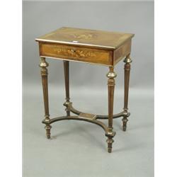 A French kingwood inlaid toilet table, with a hinged lid, a mirror inside and a sectioned comp...