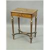 A French kingwood inlaid toilet table, with a hinged lid, a mirror inside and a sectioned comp...