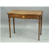 An early l9th Century mahogany and rosewood crossbanded card table, of serpentine form, with a...