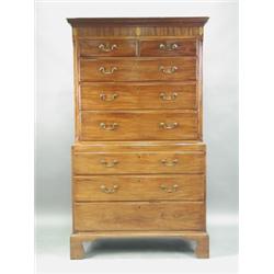 A George III mahogany chest on chest, the upper section with a dentil cornice, and inlaid frie...