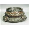 An Oriental hardwood temple vase stand decorated with bands of aquatic beasts, figureheads and...