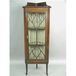 An Edwardian mahogany freestanding corner display cabinet with satinwood and ebony stringing,...