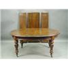 A Victorian mahogany extending dining table having two extra leaves and an additional leaf to...