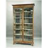 A late 19th Century inlaid mahogany display cabinet, the moulded cornice with a parquetry and...