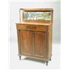 A Regency mahogany mirror back chiffonier with drawers and a base cabinet inlaid with ebony fo...