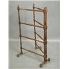 Image 1 : A turned mahogany folding towel rail, 60.5cm x 100cm high Est. 150/200...