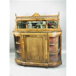 A Victorian walnut credenza with strung and inlaid decoration and gilt metal mounts, 149cm wid...