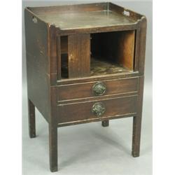 A George III mahogany tambour fronted tray top commode, 51cm wide x 77cm high x 45cm deep E...