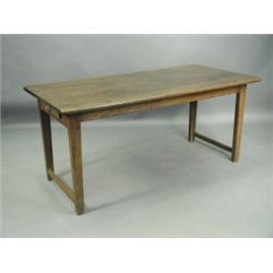 A 19th Century French chestnut (?) farmhouse table with a plank top on square tapering legs, 1...