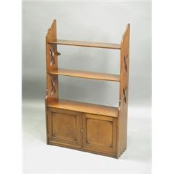 A Victorian mahogany wall shelf with cupboard doors Est. 250/350...