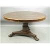 Image 1 : A Regency rosewood breakfast table on lions paw feet, 131cm diameter Est. 1200/1500...