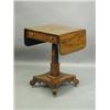 Image 1 : A Regency rosewood drop flap work table, with a single frieze drawer, opposite one dummy drawe...