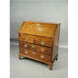 A George III mahogany bureau, the fitted interior with a well, with restoration, 92cm wide ...