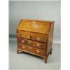 Image 1 : A George III mahogany bureau, the fitted interior with a well, with restoration, 92cm wide ...