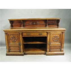 A late Victorian mahogany pedestal sideboard, with a single shelf upper section, a moulded top...