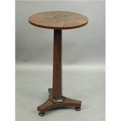 A William IV mahogany tripod table with a segmented parquetry top, 44cm diameter, 74.5cm high<...