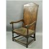 Image 1 : An 18th Century oak armchair, with a framed plank back on turned legs and all round stretchers...
