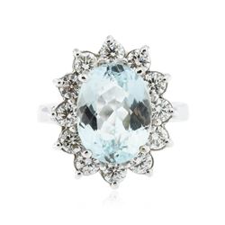 14KT White Gold 5.42 ctw Blue Topaz and Diamond Ring