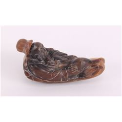 Chinese, 19th century carved horn snuff  bottle of a