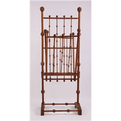 American oak stick and ball double sided magazine rack.