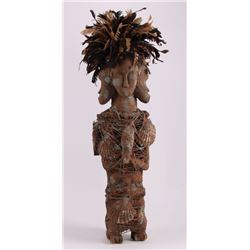 African carved wood tribal power figure.  Decorated