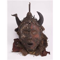 An Important Yoruba Carved and painted wood "Gelede"