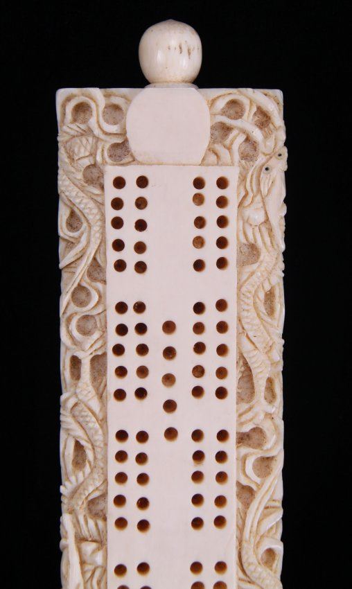 Early 20th Century, carved ivory cribbage board game,