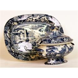 A Staffordshire pottery blue and white printed meat plate, circa 1820, with gravy well, printed w...