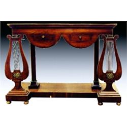 A French Louis Philippe walnut and brass mounted console table, circa 1830, the rectangular strun...